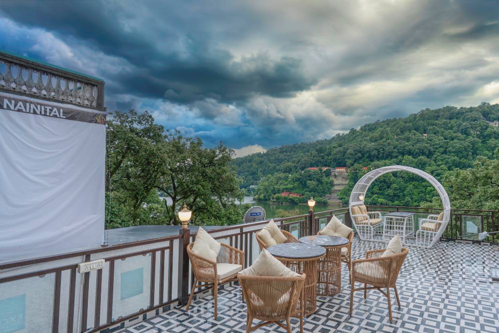 Excel Hotels & Resorts Nainital property exterior surrounded by pine forest